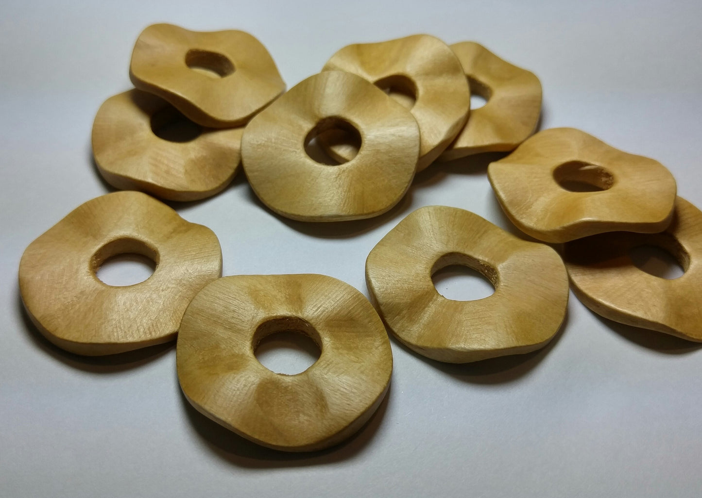 10 Hand Cut Wavy Wood Donuts